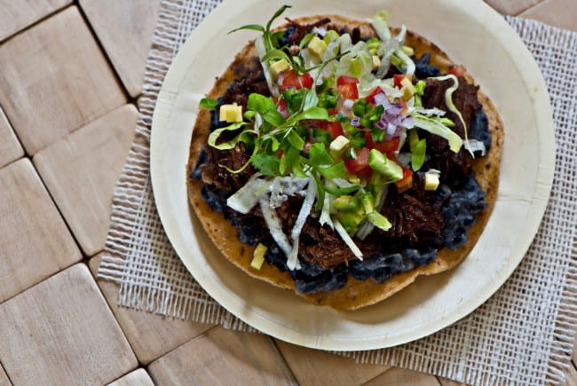 Citrus Ancho Braised Lamb Tostada yellow tortilla